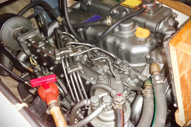 Slide: The Image of Engine of a 1997 Pacific Seacraft 37 sailboat, showcasing intricate mechanical components. - 6