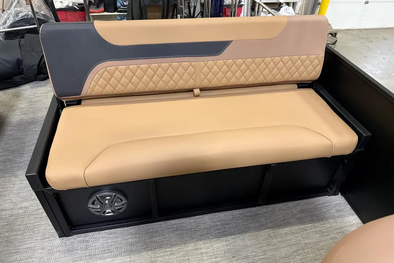 Slide: The Image of 2026 Godfrey Sweetwater 22' Tritoon lounge seat with tan upholstery and speaker. - 41