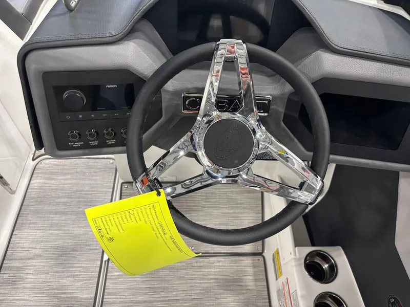 Slide: The Image of Steering wheel of 2026 Cobalt CS23 with control console. - 12