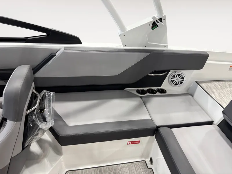 Slide: The Image of Interior of 2026 Cobalt CS23 with gray upholstery and cup holders. - 15
