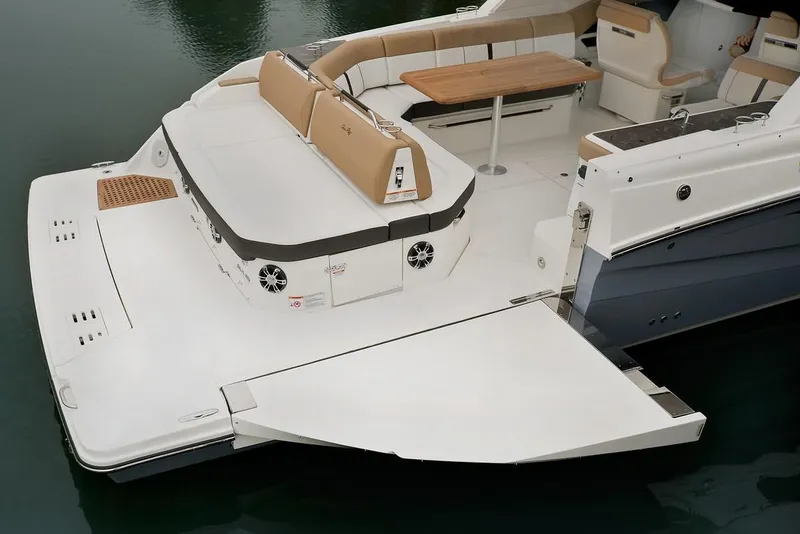 Slide: The Image of Manufacturer Provided Image: 2021 Sea Ray SLX 400 boat with spacious deck and seating area. - 22