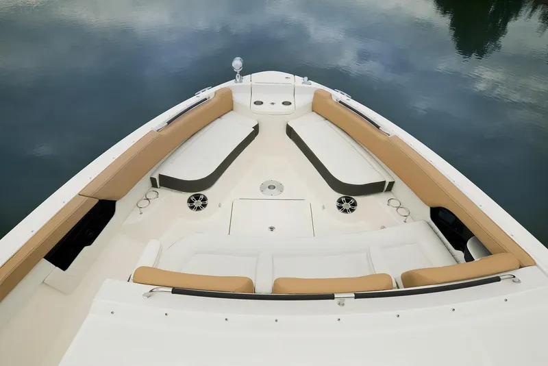 Slide: The Image of Manufacturer Provided Image: 2021 Sea Ray SLX 400 boat bow seating area on calm water. - 25
