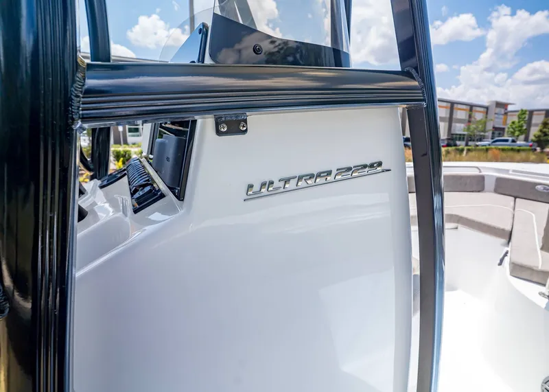 Slide: The Image of Sea Hunt Ultra 229 boat 2026, close-up of helm station. - 19