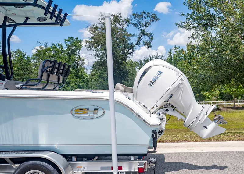 Slide: The Image of 2026 Sea Hunt Ultra 229 boat with Yamaha outboard motor. - 3