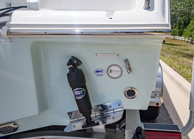 Slide: The Image of Rear view of a 2026 Sea Hunt Ultra 229 boat. - 5