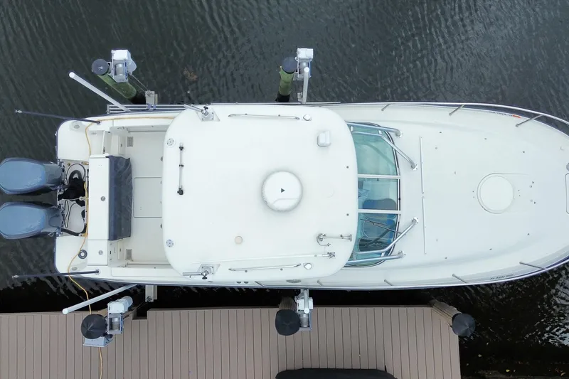 Slide: The Image of Overhead view of a 2006 Hydra-Sports Vector 2900 VX boat docked. - 13