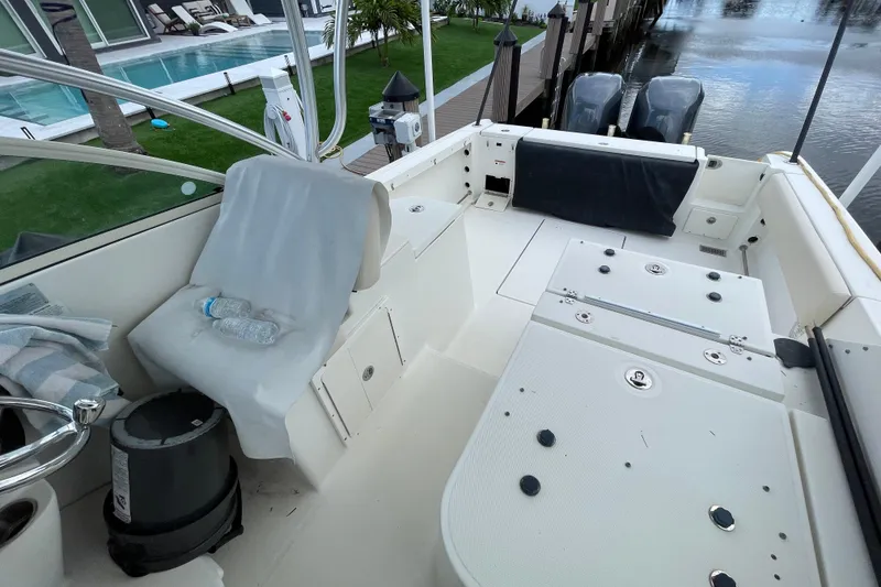 Slide: The Image of 2006 Hydra-Sports Vector 2900 VX boat interior with seating and dual outboard motors. - 30