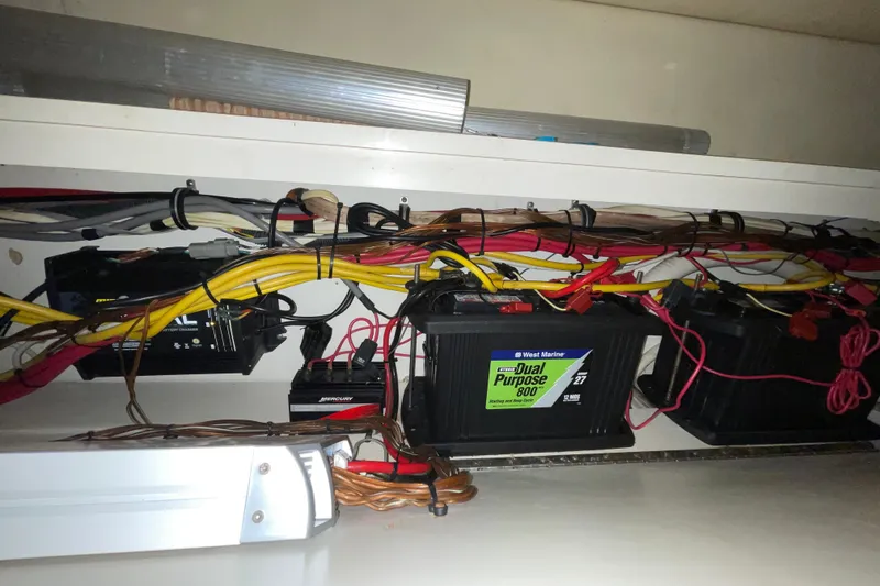 Slide: The Image of Electrical wiring and batteries inside a 2006 Hydra-Sports Vector 2900 VX boat. - 41
