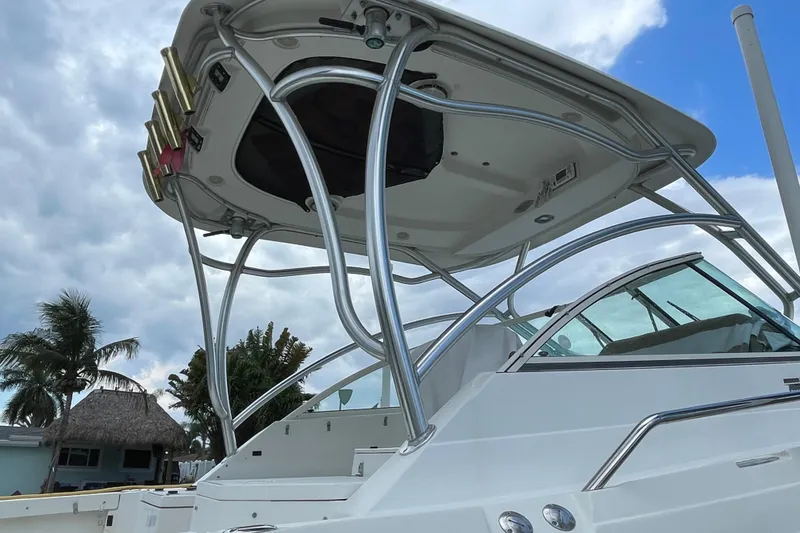 Slide: The Image of 2006 Hydra-Sports Vector 2900 VX boat with sleek design and sturdy T-top. - 52