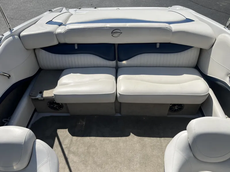 Slide: The Image of Interior of a 2008 Crownline 23 SS boat with white seating. - 12