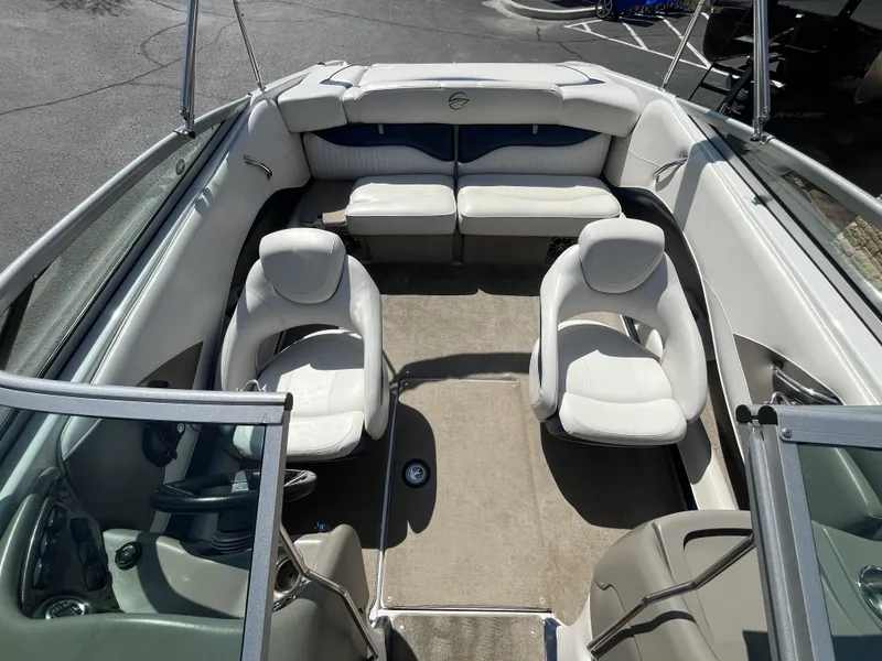 Slide: The Image of Interior of a 2008 Crownline 23 SS boat with white seating. - 22
