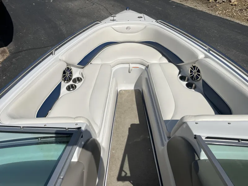 Slide: The Image of Interior of a 2008 Crownline 23 SS boat with white seating. - 25