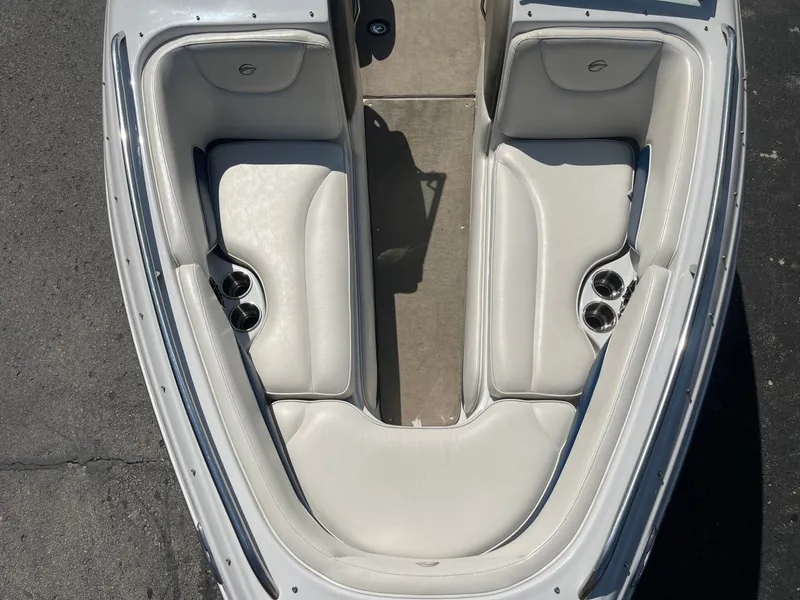 Slide: The Image of Interior view of a 2008 Crownline 23 SS boat with white seating. - 39
