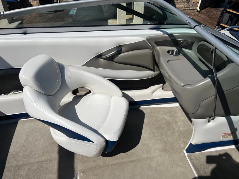 Slide: The Image of Interior of a 2008 Crownline 23 SS boat with gray seating. - 48