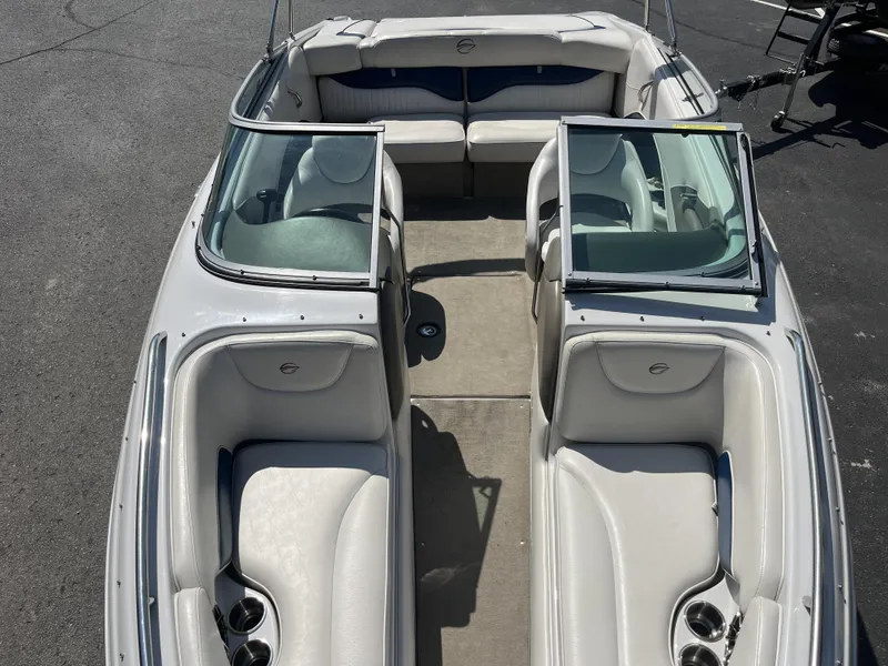 Slide: The Image of Interior of a 2008 Crownline 23 SS boat with white seating. - 7
