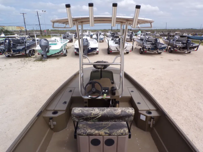 Slide: The Image of 2022 G3 Gator Tough 20 boat in a lot with other boats. - 16
