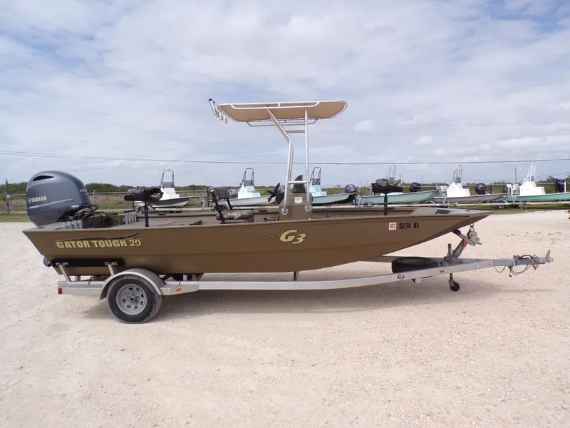 Slide: The Image of 2022 G3 Gator Tough 20 boat on trailer, side view. - 7
