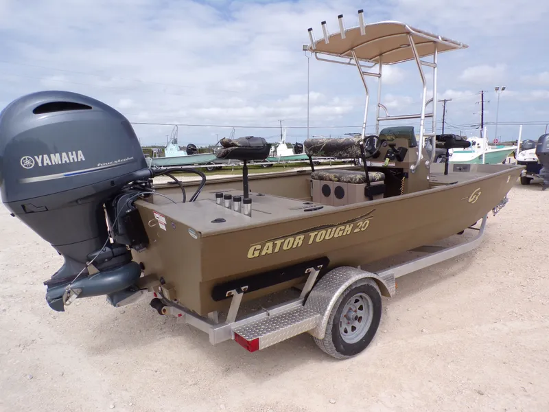 Slide: The Image of 2022 G3 Gator Tough 20 boat with Yamaha motor on trailer. - 8