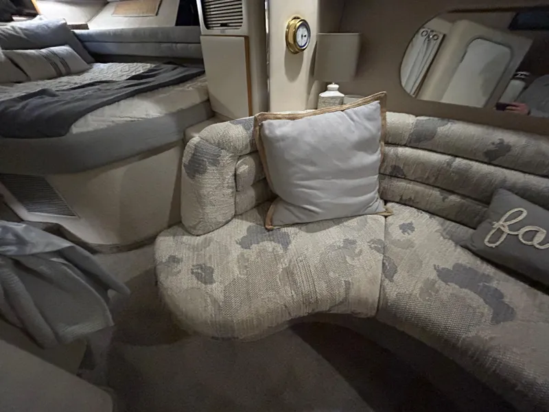 Slide: The Image of Interior of 1992 Sea Ray 370 Sundancer with cozy seating and elegant decor. - 7