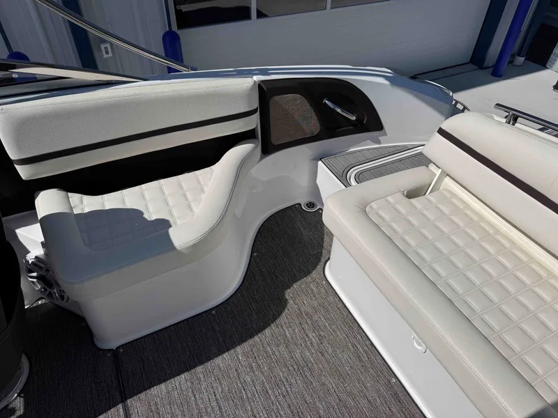 Slide: The Image of Interior of a 2021 Cobalt R5 boat with white upholstered seats. - 11
