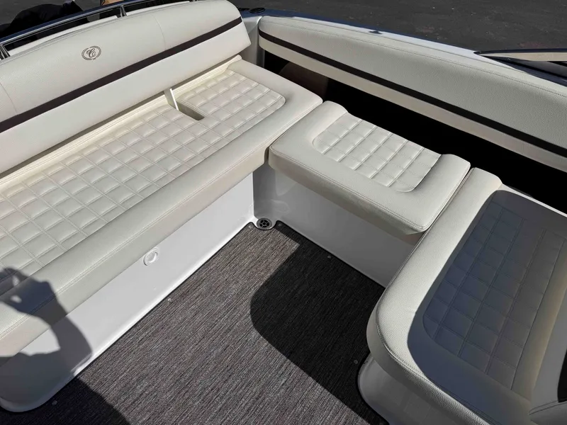 Slide: The Image of Interior of a 2021 Cobalt R5 boat with white leather seating. - 12