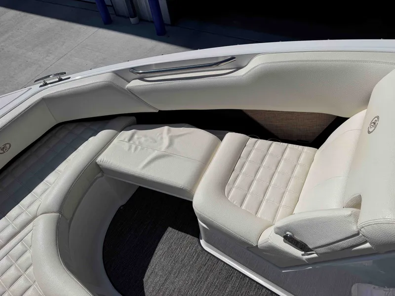 Slide: The Image of Interior of a 2021 Cobalt R5 boat with white leather seating. - 25
