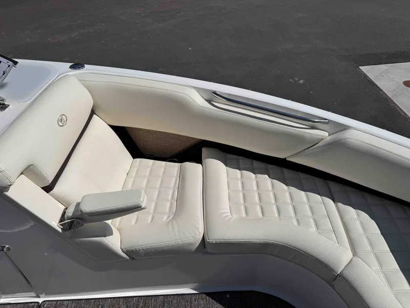 Slide: The Image of Interior of a 2021 Cobalt R5 boat with white leather seating. - 26