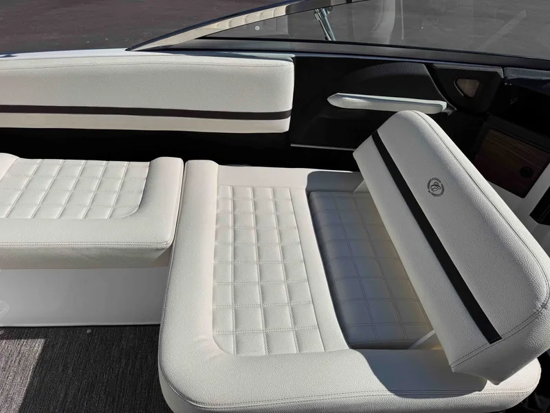 Slide: The Image of Interior of a 2021 Cobalt R5 boat with white upholstery. - 28
