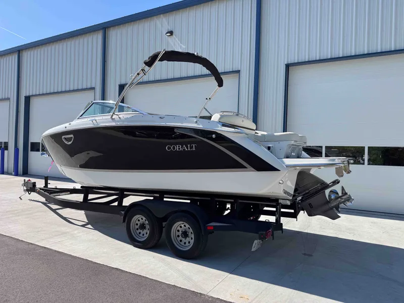 Slide: The Image of 2021 Cobalt R5 boat on trailer outside warehouse. - 3