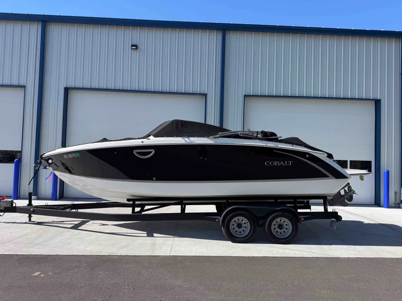 Slide: The Image of 2021 Cobalt R5 boat on trailer in front of warehouse. - 31