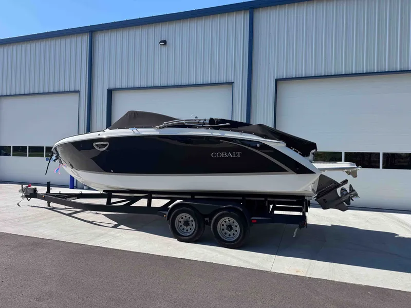 Slide: The Image of 2021 Cobalt R5 boat on trailer outside warehouse. - 33