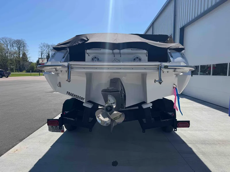 Slide: The Image of Rear view of a 2021 Cobalt R5 boat on a trailer. - 34