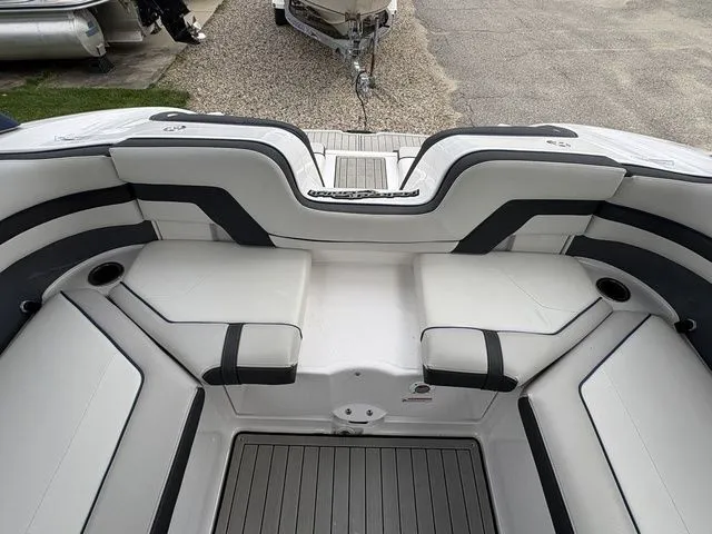 Slide: The Image of Interior of a 2020 Yamaha Boats 242 SE Limited with white seating. - 11