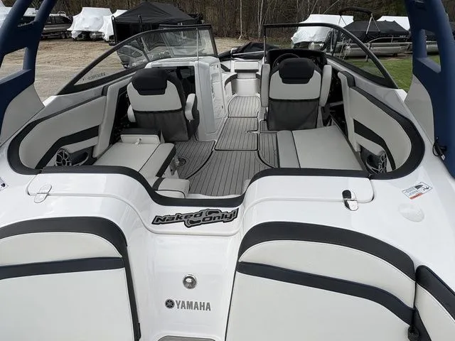 Slide: The Image of Interior of a 2020 Yamaha Boats 242 SE Limited with luxurious seating. - 13