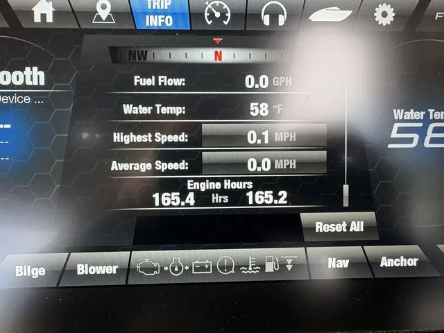 Slide: The Image of Yamaha Boats 242 SE Limited 2020 display showing engine data and water temperature. - 24