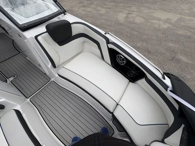 Slide: The Image of Interior of a 2020 Yamaha Boats 242 SE Limited with white seating. - 7