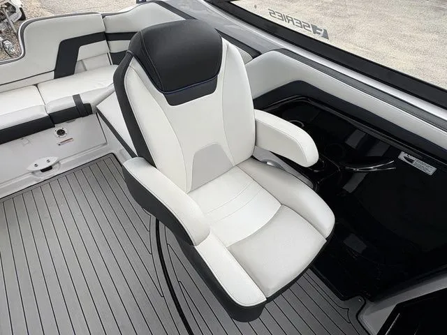 Slide: The Image of Interior of a 2020 Yamaha Boats 242 SE Limited with luxurious seating. - 8