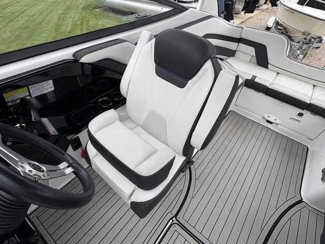 Slide: The Image of Interior of a 2020 Yamaha Boats 242 SE Limited with luxurious seating. - 9