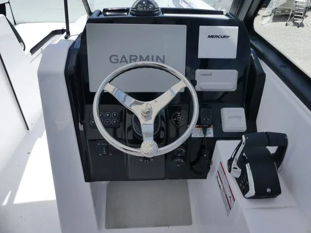 Slide: The Image of Twin Vee 280 GFX2 Dual Console 2026 helm with Garmin and Mercury equipment. - 11