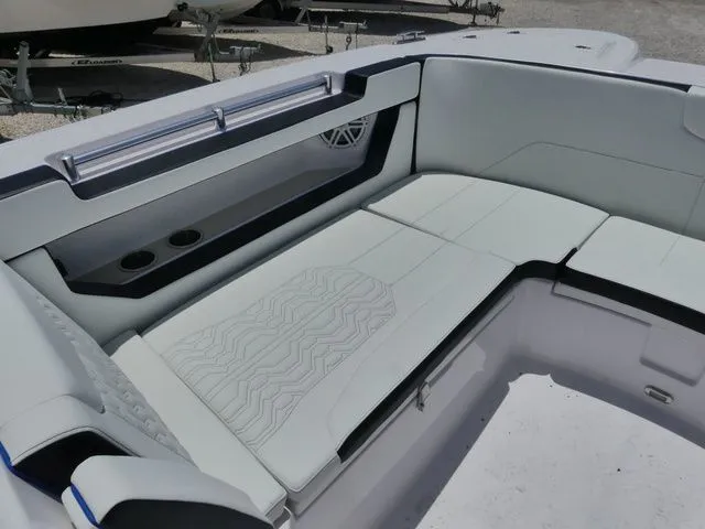 Slide: The Image of Interior of the 2026 Twin Vee 280 GFX2 Dual Console boat. - 18