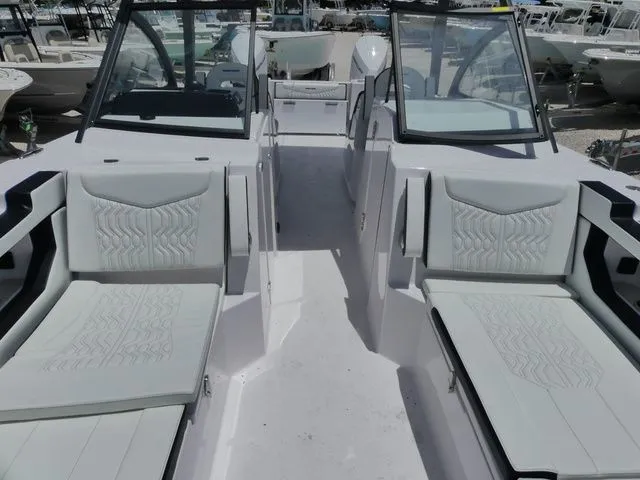 Slide: The Image of Interior of Twin Vee 280 GFX2 Dual Console boat, 2026 model. - 20