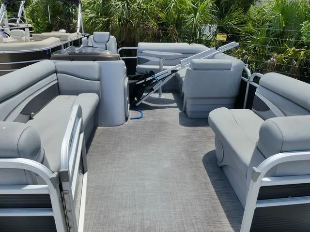Slide: The Image of Interior of a 2021 Bennington 20 SVF pontoon boat with gray seating. - 11