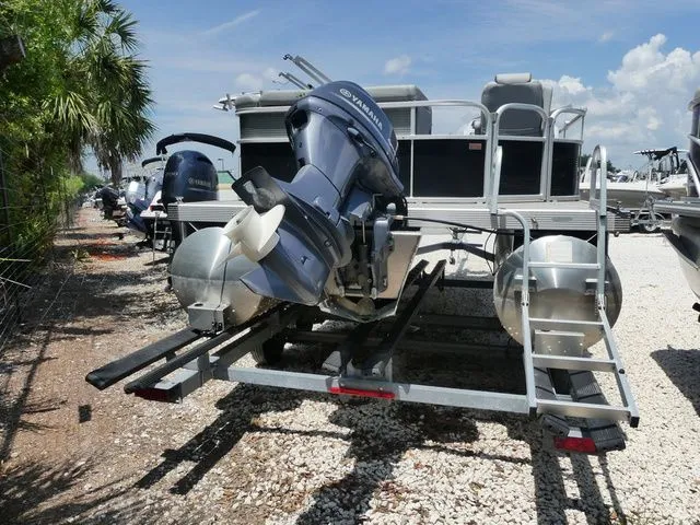 Slide: The Image of 2021 Bennington 20 SVF pontoon boat on trailer with Yamaha engine. - 3