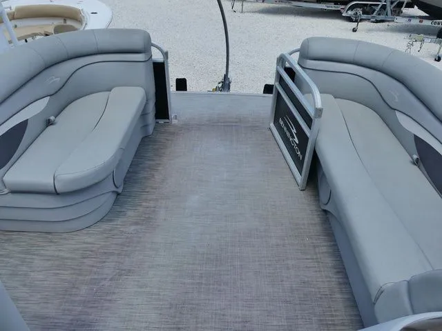 Slide: The Image of Interior of a 2021 Bennington 20 SVF pontoon boat with gray seating. - 8