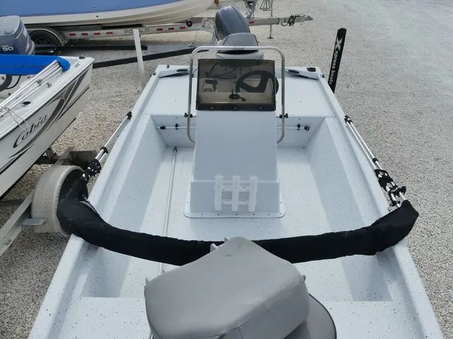 Slide: The Image of 2021 Xpress Boats XP18CC parked on gravel lot. - 14