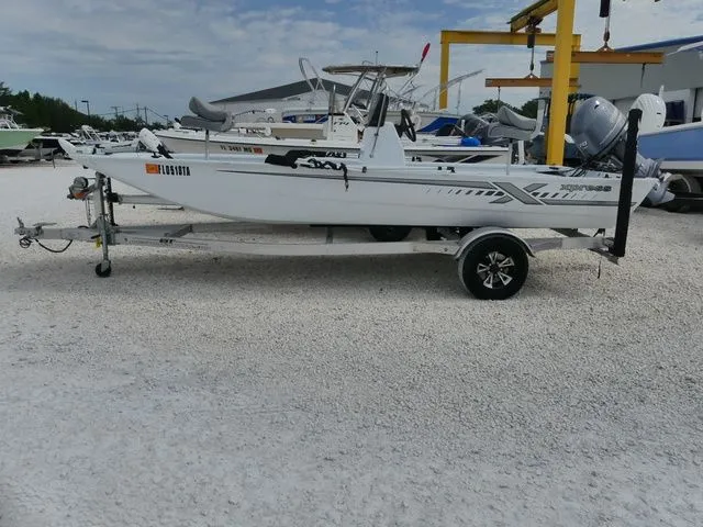 Slide: The Image of 2021 Xpress Boats XP18CC on trailer, side view. - 3