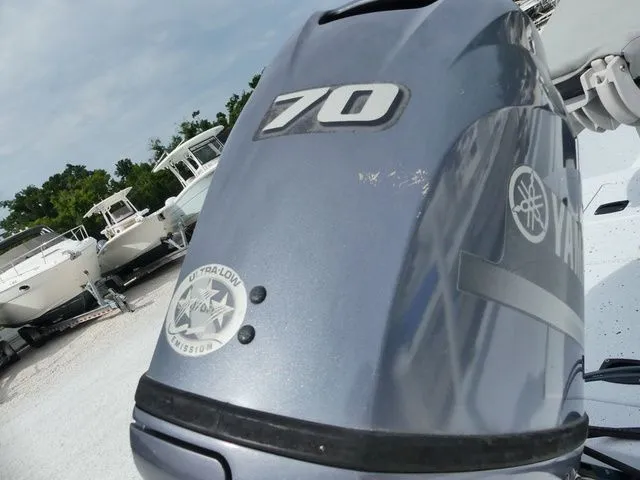 Slide: The Image of Yamaha 70 HP outboard motor on a 2021 Xpress Boats XP18CC. - 5