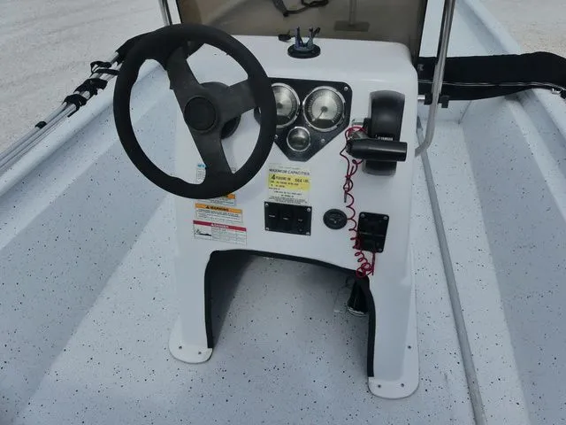 Slide: The Image of Steering console of a 2021 Xpress Boats XP18CC. - 8