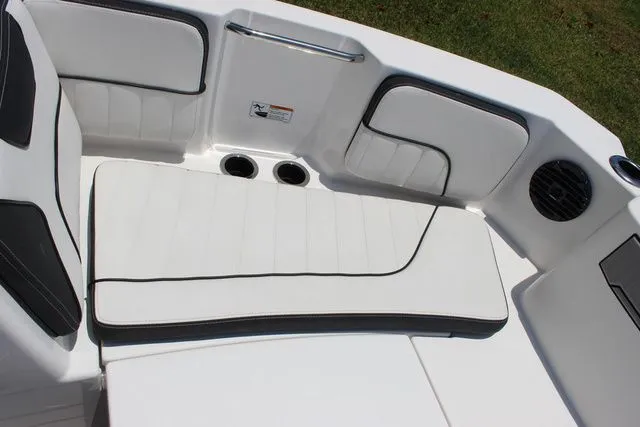 Slide: The Image of Interior of Yamaha Boats 222 FSH Sport E 2023 with white upholstery. - 25
