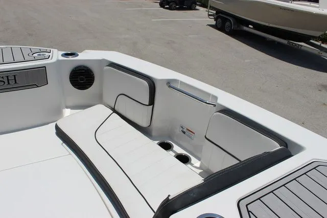 Slide: The Image of Interior view of 2023 Yamaha Boats 222 FSH Sport E with seating area. - 27
